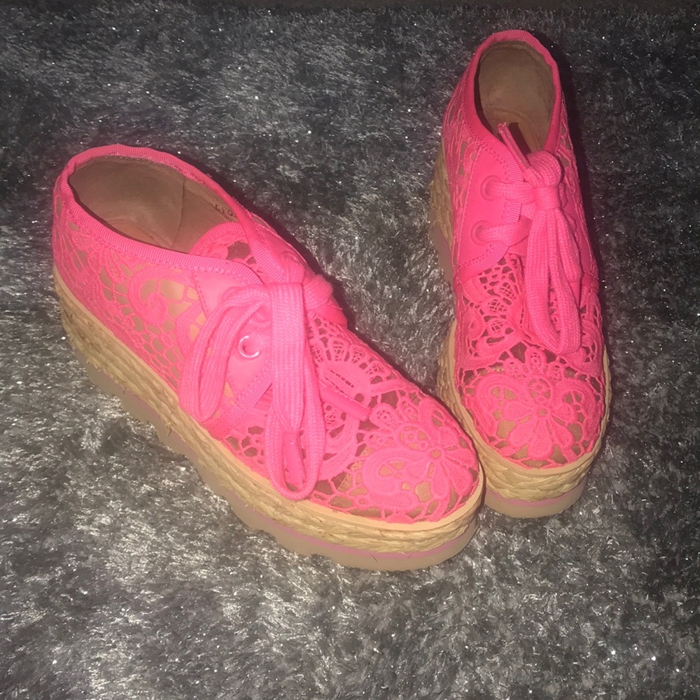 Bright pink platform shoes